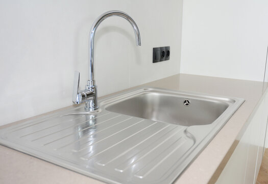 Kitchen sink faucet in modern home interior