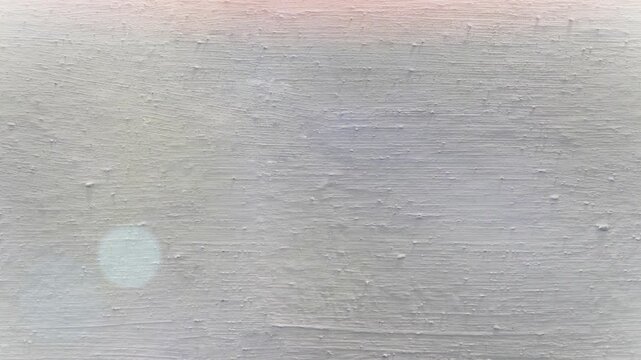 Seamless 4K looping vertical movement over a light white plaster surface with soft natural texture. Excellent for clean backgrounds interior design and creative video projects.