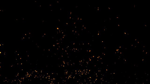 Burning hot fire sparks and ember dust particles rising fast on black background, suitable for dramatic footage and visual effects,  realistic bonfire flares overlay loop with video editing. 4k