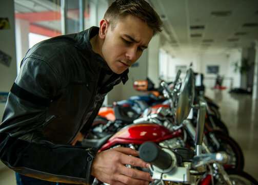 Inspecting Motorcycle Controls.