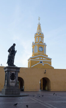 Clock tower and pedro de heredia statue in cartagena