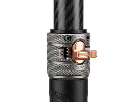 Carbon fiber tripod leg lock quick release mechanism macro detail studio photography equipment camera gear support system precision engineering metallic monopod clamp isolated black background close u