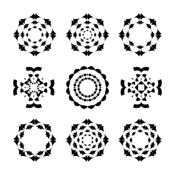 Set of Decorative Radial Design Elements in Circle and Cross Shape. 