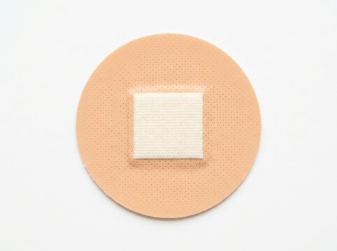 Round adhesive bandage isolated on white background