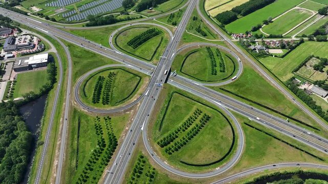 Highway cloverleaf junction with transport infrastructure in Europe