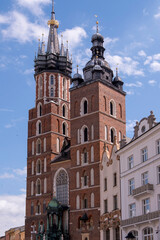 Obraz premium Towers of the Basilica of St. Mary located in the Main Market Square of Krakow, Poland.