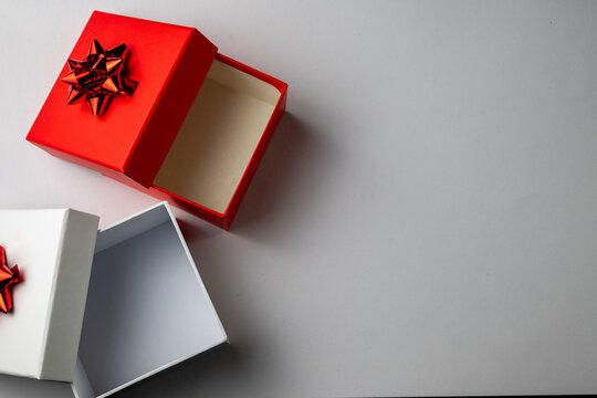 Decorative Gift Boxes With Red Bows on White Background
