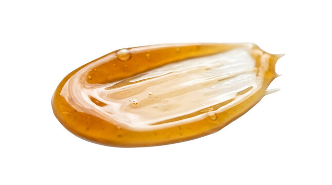 Translucent golden cosmetic gel smear or amber honey sample