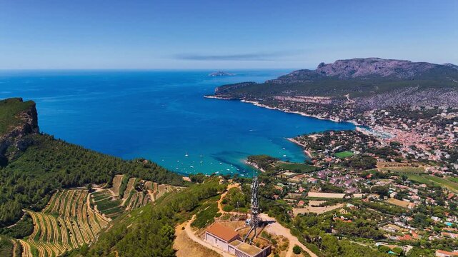 Aerial drone view of bay with turquoise sea and the town of Cassis, Provence, Alps, Cote dAzur, Marseille district, France. High quality 4k footage