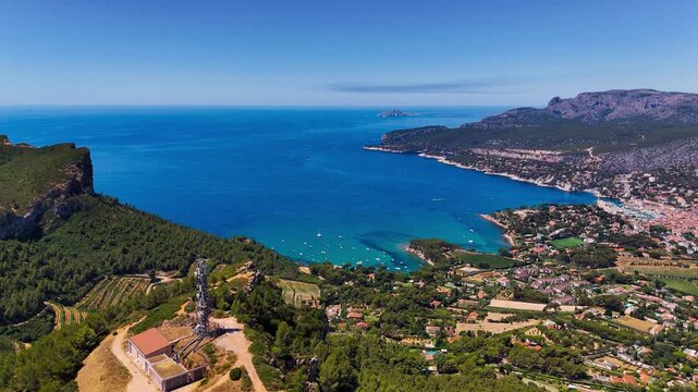 Aerial drone view of bay with turquoise sea and the town of Cassis, Provence, Alps, Cote dAzur, Marseille district, France. High quality 4k footage
