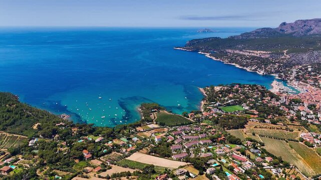 Aerial drone view of bay with turquoise sea and the town of Cassis, Provence, Alps, Cote dAzur, Marseille district, France. High quality 4k footage