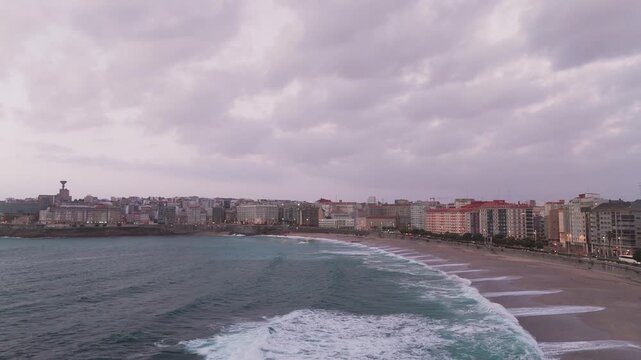 Orzan beach cityscape with atlantic ocean waves