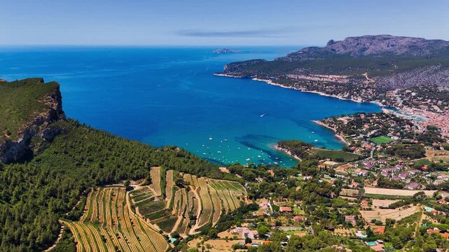 Aerial drone view of bay with turquoise sea and the town of Cassis, Provence, Alps, Cote dAzur, Marseille district, France. High quality 4k footage