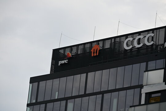 Wroclaw Office Building with Pyszne.pl, PwC and CCC Logos