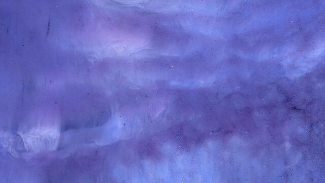 Mixing alcohol inks and epoxy resin in various colors for art creation