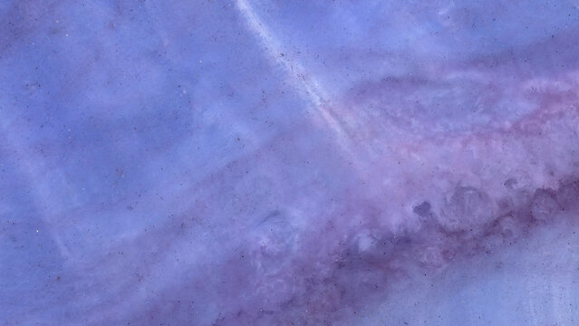 Mixing different colored alcohol inks with epoxy resin in close-up view