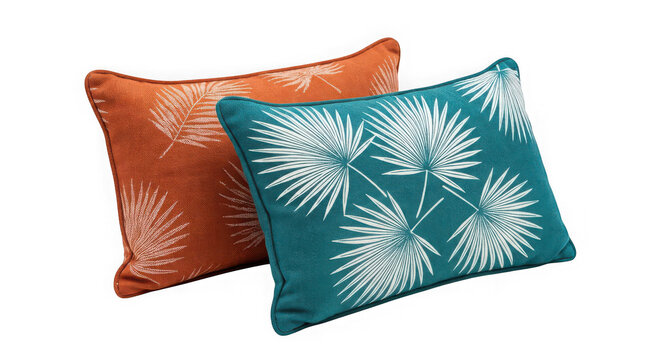 Two decorative rectangular throw pillows with a palm leaf pattern in orange and teal isolated on transparent background