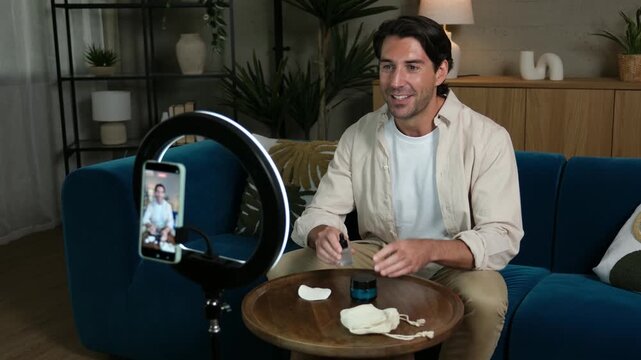 Influencer reviewing skincare products and making content for his social media blog at home