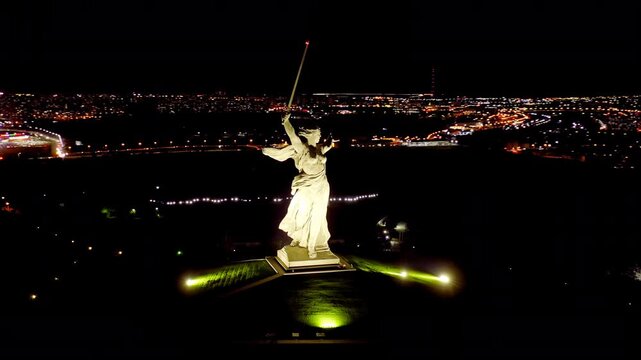 Volgograd, Russia. Night view of the sculpture of Rodina the Mother is calling! on Mamaev Kurgan in Volgograd. Drone footage