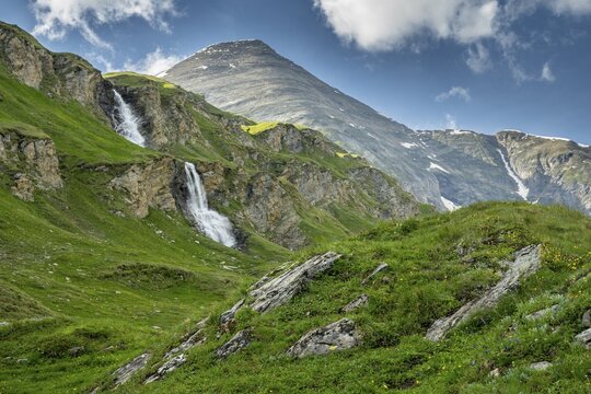 Waterfall and mountain meadows at Nassfeld, Heiligenblut, Carinthia, Austria
