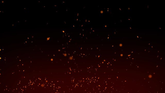 Abstract fire dust particles, realistic campfire smoke overlay loop for dramatic visual effects and motion graphic video editing, and glowing embers flying in wind on dark black background. 4k
