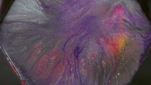 Shimmer spatter. Paint spill rhombus. Blur purple blue orange color geometric gem texture glitter particles on abstract art background.