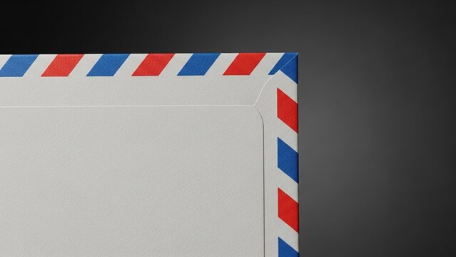 Close up view of an airmail envelope border with red and blue stripes