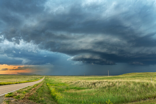 Storm cell formation in Tornado Alley over farmland