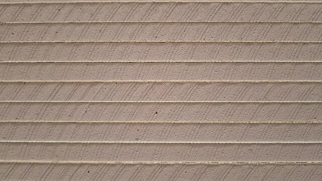 Stacked gypsum drywall sheets lie on top of each other. construction materials, building supply, hardware store warehouse.