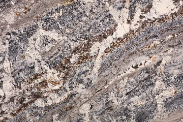 Fotobehang Marmer Polished granite slab surface with grey and rust brown veining  © Dmytro Synelnychenko
