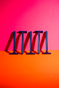 Shaving razors on a colored background