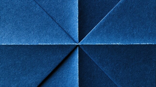 Geometric folded blue paper origami pattern