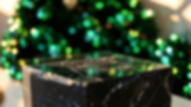 Rough obsidian dark stone product display podium against blurred green bokeh holiday lights background for minimalist luxury cosmetic mockups and festive jewelry presentation