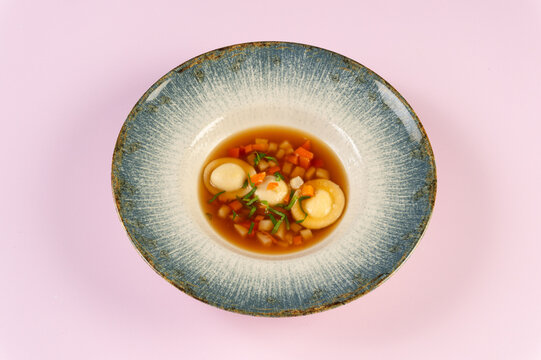 Clear Beef Consomme Soup with Root Vegetables and Homemade Noodles