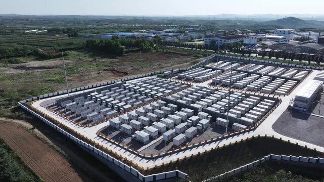 Aerial view of large-scale energy storage power station array with modular battery units