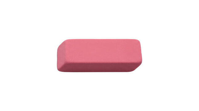 A pink rubber eraser isolated on a black background. Minimalist object for education, office supply, correction, school, mistake, or editing concepts. High quality cutout element.