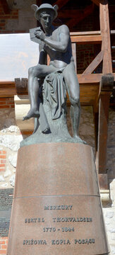 KRACOW POLAND: Bronze of Mercury is the patron god of financial gain, commerce, eloquence and communications. This sculpture is near St. Florian's Gate by Bertel Thorvaldsen