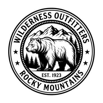 Round wilderness outfitters badge featuring a bear and mountains, rocky mountain