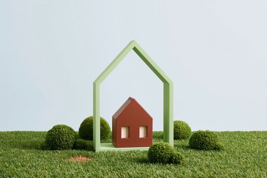 Mint green house outline enclosing a small brown miniature building on a grassy lawn, featuring a fresh mood and copy space for real estate services