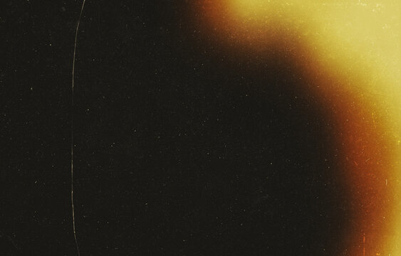 Vintage Warm Light Leak Film Grain Texture with Dust Specks and Scratches Overlay