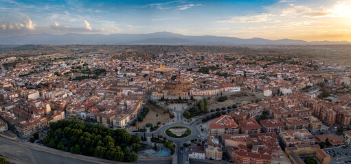 Fototapeta premium Aerial panorama of Guadix, Granada, Spain, with Cathedral and Sierra Nevada at sunset 