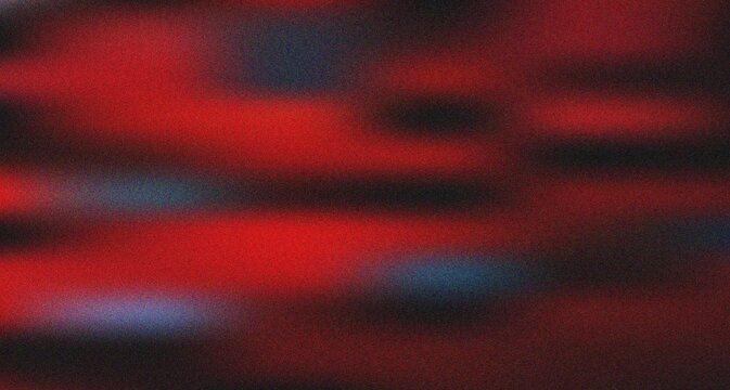 Dynamic abstract blur with vibrant red and deep black color streaks creating a mysterious modern pattern