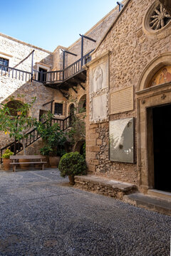 Toplou Monastery, Crete. The  courtyard and church facade. Prefecture of Lasithi, Greece
