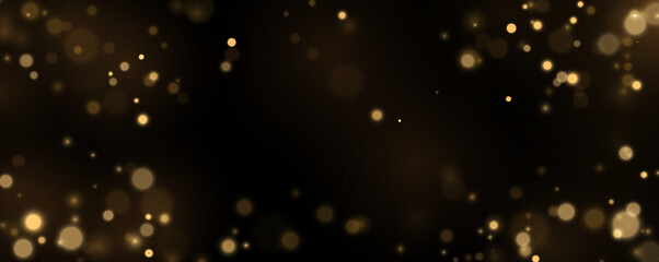 Soft golden bokeh glows in a dark atmosphere. Shimmering particles create a magical mood. Luxury holiday illustration. © Extrastock