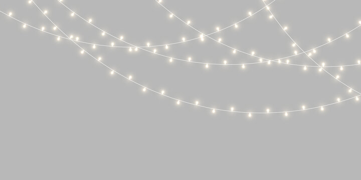 PNG holiday garland featuring warm glowing bulbs and delicate golden wire. Transparent background offers flexible placement. Great for Christmas artwork.