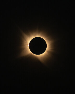 Terra Cha, Lugo, Spain - 12 August 2026: View of a total solar eclipse with the sun's corona visible in the dark sky.
