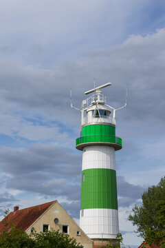 Traditional Buelk lighthouse in portait format.