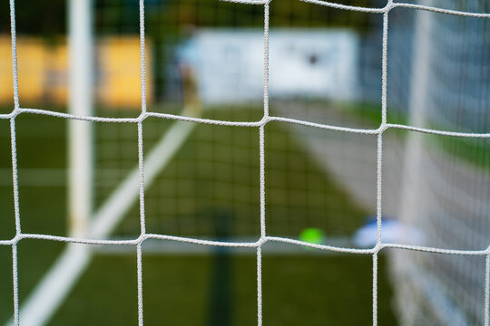 Details regarding the outdoor football pitch and netting
