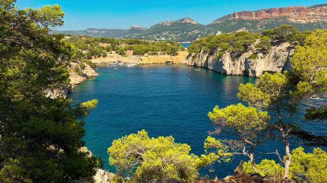 Calanques, also known as French fjords, winding bays with turquoise water among high cliffs. Provence, Alps, Cote dAzur, Marseille district, France. High quality 4k footage