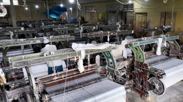 Textile Weaving Factory With Rows Of Power Looms